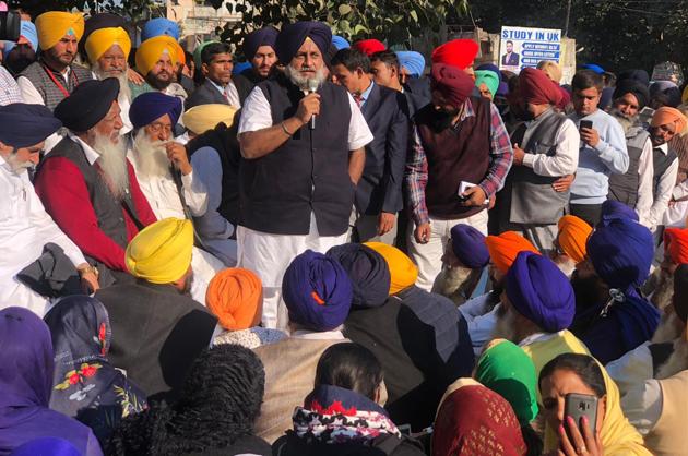 SAD president Sukhbir Singh Badal addressing a gathering during a dharna outside the SSP office on Saturday (HT PHOTO) SAD president Sukhbir Singh Badal addressing a gathering during a dharna outside the SSP office on Saturday (HT PHOTO)