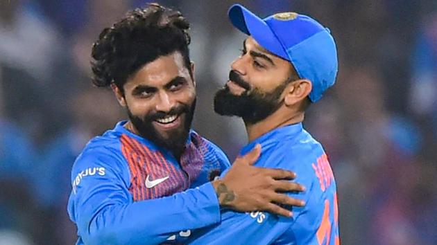 India's Ravindra Jadeja with skipper Virat Kohli celebrate the dismissal of West Indies batsman Brandon King.(PTI) India's Ravindra Jadeja with skipper Virat Kohli celebrate the dismissal of West Indies batsman Brandon King.(PTI)
