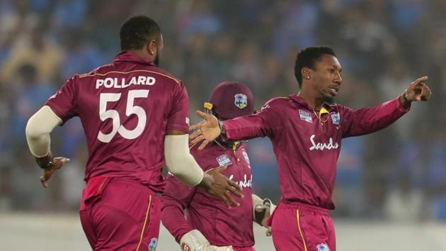 West Indies' Kieron Pollard celebrates with teammates. (AP) West Indies' Kieron Pollard celebrates with teammates. (AP)