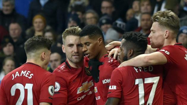 Manchester United's Marcus Rashford, center, celebrates with teammates after scoring his side's opening goal. (AP) Manchester United's Marcus Rashford, center, celebrates with teammates after scoring his side's opening goal. (AP)