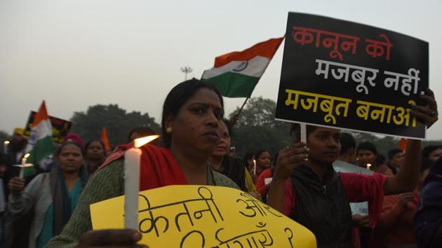 New Delhi, India- December 7, 2019: Supporters of Delhi Commission for Women (DCW) chairperson Swati Maliwal hold placards to demand justice for the rape and murder of the Unnao rape survivor who was burnt alive by her alleged rapists, at Shahidi Park, ITO, in New Delhi, India, on Saturday, December 07, 2019. Maliwal is on a hunger strike for the fifth consecutive day to demand capital punishment for rape suspects within six months of their conviction. (Photo by Sonu Mehta/ Hindustan Times)(Sonu Mehta/HT PHOTO)