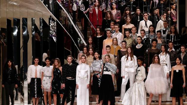 Models present creations during the Metiers D'Art Show for Chanel fashion house in Paris, France. (REUTERS)