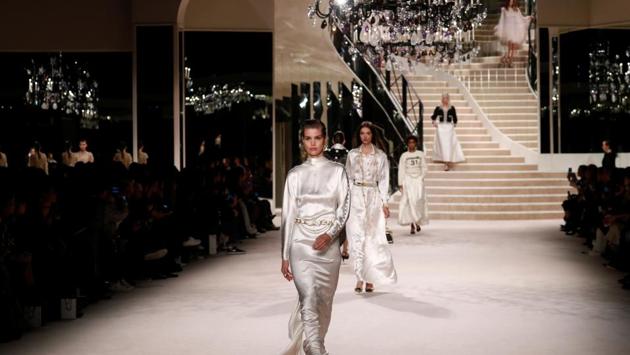 A model presents a creation during the Metiers D'Art Show for Chanel fashion house. (REUTERS)