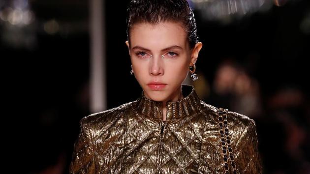 A model presents a creation during the Metiers D'Art Show for Chanel fashion house. (REUTERS)