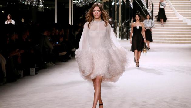 A model presents a creation during the Metiers D'Art Show for Chanel fashion house. (REUTERS)