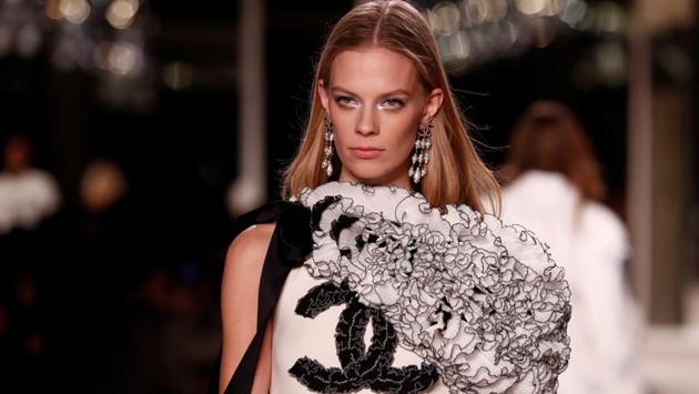 A model presents a creation during the Metiers D'Art Show for Chanel fashion house in Paris. (REUTERS)