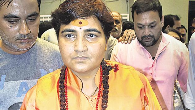 BJP MP Pragya Singh Thakur reached a police station here on Saturday night, demanding that a case be registered against a Congress MLA(PTI)