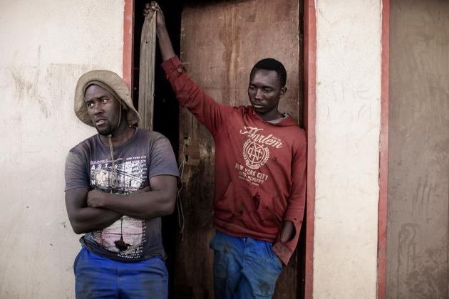 A few miles away from Hamasab’s garden, Absalom Mbautaenge shares a corrugated iron shack with four brothers and a young girl from a remote village. They scrape by on firewood, which they collect in the area and sell to a broker.”There is no rain in this area,” said Mbautaenge, 37, his clothes blackened by charcoal. “But you just give me opportunity, training and livestock and I will do something different.” (GIANLUIGI GUERCIA / AFP) A few miles away from Hamasab’s garden, Absalom Mbautaenge shares a corrugated iron shack with four brothers and a young girl from a remote village. They scrape by on firewood, which they collect in the area and sell to a broker.”There is no rain in this area,” said Mbautaenge, 37, his clothes blackened by charcoal. “But you just give me opportunity, training and livestock and I will do something different.” (GIANLUIGI GUERCIA / AFP)