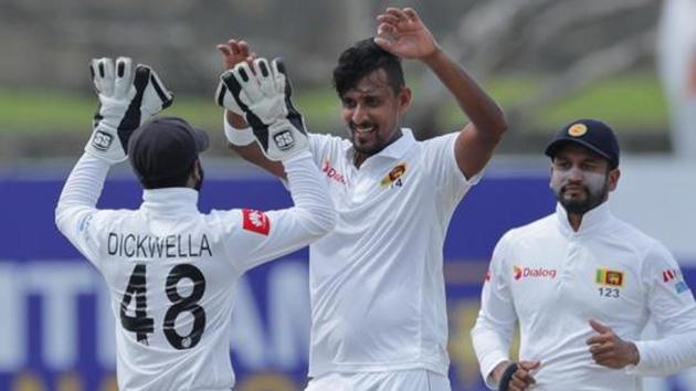 Suranga Lakmal, center, during the first test match between Sri Lanka and New Zealand in Galle, Sri Lanka.(AP)