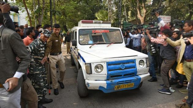 The process to transport the bodies of the deceased from Lok Nayak hospital began today, as police personnel facilitated the movement and media persons stood glued to the spot. “Their only fault was they were poor. Why else would someone work and sleep in such a congested place?” added Ali, who used to work in the same building. (Amal KS / HT Photo)
