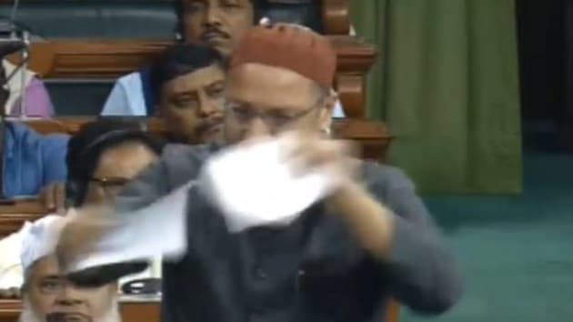Asaduddin Owaisi seen ripping the citizenship bill in Parliament on Dec 9, 2019. (ANI photo) Asaduddin Owaisi seen ripping the citizenship bill in Parliament on Dec 9, 2019. (ANI photo)