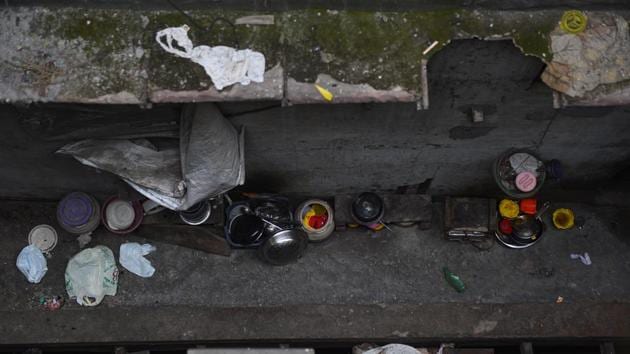 Utensils used by the deceased victims had been recovered and collected in one place by the police on Sunday. Most of the factory workers lived in cramped rooms that were shared by 10 to 15 men each. (Sanchit Khanna / HT Photo)
