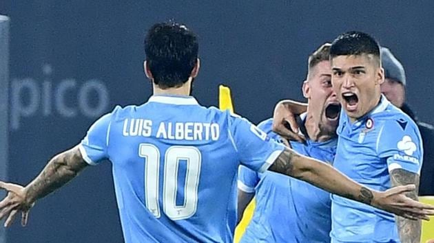 Lazio's Sergej Milinkovic-Savic, center, celebrates with his teammates Luis Alberto and Joaquin Correa.(AP)