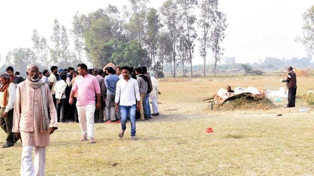 Villagers during the funeral procession of Unnao rape and burns victim, at her village in Unnao. (ANI Photo) Villagers during the funeral procession of Unnao rape and burns victim, at her village in Unnao. (ANI Photo)