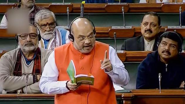 Union Home Minister Amit Shah speaks in the Lok Sabha during the ongoing Winter Session of Parliament, in New Delhi, Monday,(PTI)