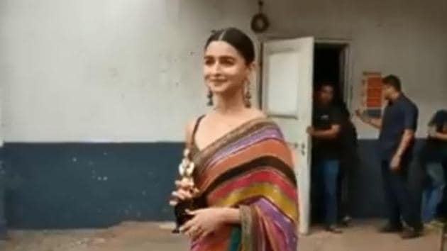 Alia Bhatt walks out of the venue through the back door.