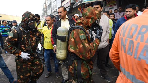 New Delhi, India - Dec. 8, 2019: National Disaster Response Force (NDRF) teams deployed at the spot where a fire broke out in a plastic factory, at Anaj Mandi, Filmistan, in New Delhi. (Sanchit Khanna/HT PHOTO) New Delhi, India - Dec. 8, 2019: National Disaster Response Force (NDRF) teams deployed at the spot where a fire broke out in a plastic factory, at Anaj Mandi, Filmistan, in New Delhi. (Sanchit Khanna/HT PHOTO)