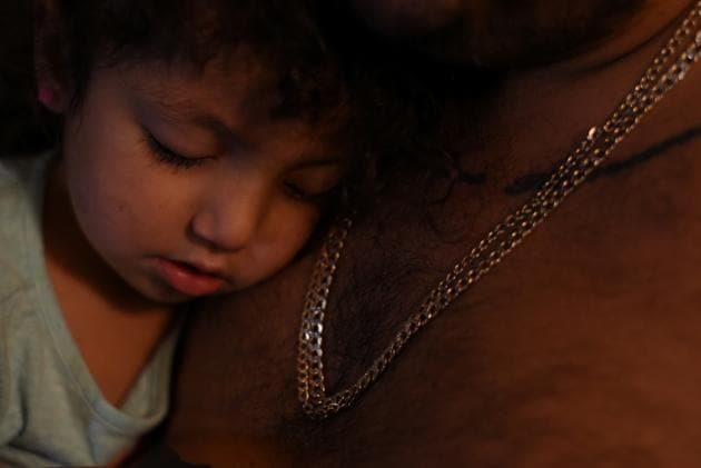 Zayleeana Tiemann rests her head on her father’s chest before going to school. Warren’s plan would modify insurance payment systems and reward hospitals that are successful in improving care. For Tiemann, losing his partner due to pregnancy-related complications still stirs deep frustration. “I just look back and I wonder if it could have been prevented. But I don’t know,” he said. (Callaghan O'Hare / REUTERS) Zayleeana Tiemann rests her head on her father’s chest before going to school. Warren’s plan would modify insurance payment systems and reward hospitals that are successful in improving care. For Tiemann, losing his partner due to pregnancy-related complications still stirs deep frustration. “I just look back and I wonder if it could have been prevented. But I don’t know,” he said. (Callaghan O'Hare / REUTERS)