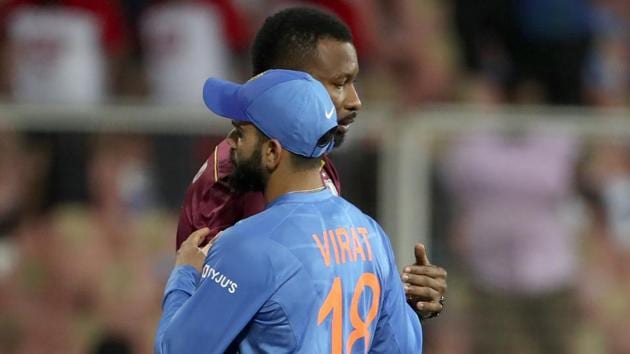 West Indies' captain Kieron Pollard, rear, hugs India's captain Virat Kohli. (AP) West Indies' captain Kieron Pollard, rear, hugs India's captain Virat Kohli. (AP)