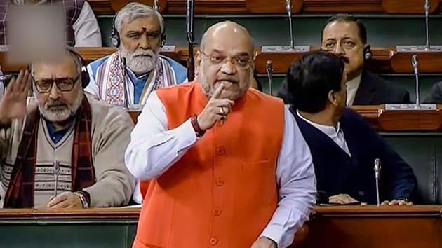 Union Home Minister Amit Shah in the Lok Sabha during the ongoing Winter Session of Parliament in New Delhi on Monday.(PTI Photo)