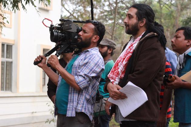 (Right) Bhaskar Hazarika in a a still from the shoot of Aamis