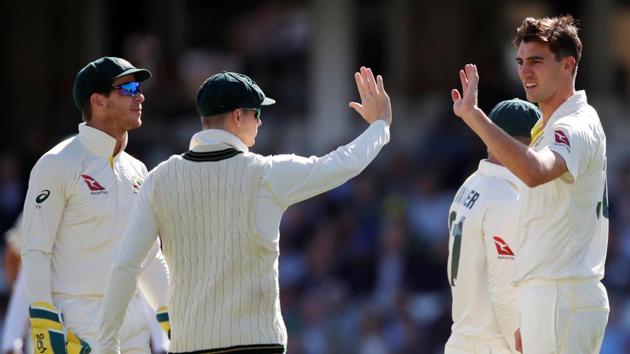 File image: Australia's Pat Cummins celebrates with teammates after taking a wicket(Action Images via Reuters)