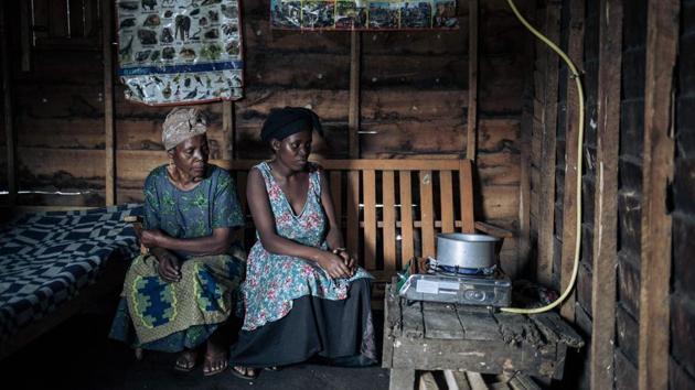 The trade in charcoal -- known locally as makala -- is worth millions of dollars and it is attracting armed groups to the Goma area, threatening Virunga natural park, a sanctuary for endangered mountain gorillas. More than 2,000 kilometres (1,200 miles) to the west, the reliance on charcoal in Kinshasa is also causing severe problems. Kinshasa residents consume five million tonnes of wood a year, according to French research group Cirad, and increasing urbanisation is just raising the pressure on the forests. (ALEXIS HUGUET / AFP) 