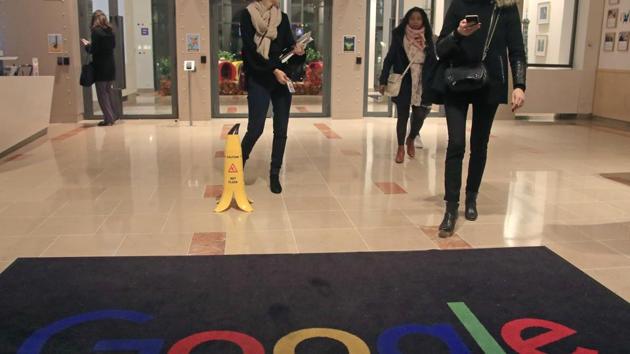 In this Nov.18, 2019 file photo, Google employees walks out of the entrance hall of Google France in Paris. (AP) In this Nov.18, 2019 file photo, Google employees walks out of the entrance hall of Google France in Paris. (AP)