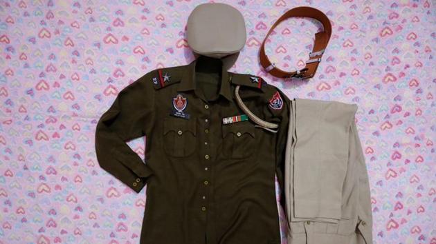 Baljit Kaur’s police uniform is laid out on her bed at her staff quarters, where she works as an Assistant Sub Inspector (ASI) for Punjab Police in Fatehgarh Sahib, Sirhind. Baljit lives two lives. In the first, she’s a policewoman, composed and authoritative in a pressed uniform and red lipstick. In the second, she’s an aging bride, abandoned by her husband and sleeping under sheets printed with red hearts. (Anushree Fadnavis / REUTERS)