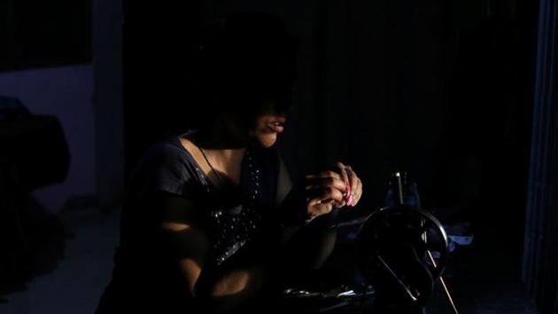 Sarbjeet Kaur sews a garment at her house in Gurdaspur. Sarbjeet Kaur’s husband stopped sending money for his daughter’s school fees in 2016, with three months left in the term. Sarbjeet sold her sofa and two cupboards so she could finish. Last year, she sold the gold earrings her parents had given to her daughter – again, for school fees, this time at her new, cheaper school. (Anushree Fadnavis / REUTERS)