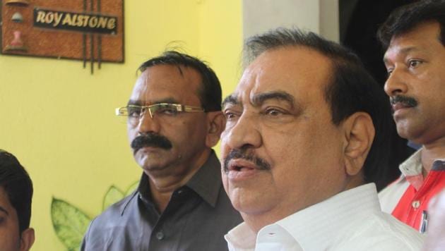 BJP leader Eknath Khadse leaves after meeting with party leader Pankaja Munde at her residence in Mumbai, on Tuesday. (Bhushan Koyande/HT Photo) BJP leader Eknath Khadse leaves after meeting with party leader Pankaja Munde at her residence in Mumbai, on Tuesday. (Bhushan Koyande/HT Photo)