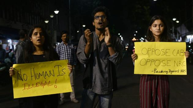 Students of Presidency University staged a protest against the National Register of Citizens (NRC) and Citizenship Amendment Bill (CAB) in front of Presidency University at College Street in Kolkata. (Samir Jana/ Hindustan Times) Students of Presidency University staged a protest against the National Register of Citizens (NRC) and Citizenship Amendment Bill (CAB) in front of Presidency University at College Street in Kolkata. (Samir Jana/ Hindustan Times)