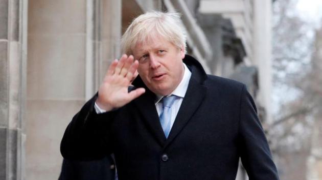 Britain's Prime Minister Boris Johnson waves as he arrives at a polling station, at the Methodist Central Hall, to vote in the general election in London. (REUTERS) Britain's Prime Minister Boris Johnson waves as he arrives at a polling station, at the Methodist Central Hall, to vote in the general election in London. (REUTERS)