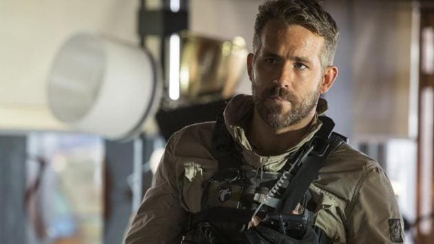 6 Underground movie review: Ryan Reynolds gets a taste of Bayhem.(Christian Black/Netflix)