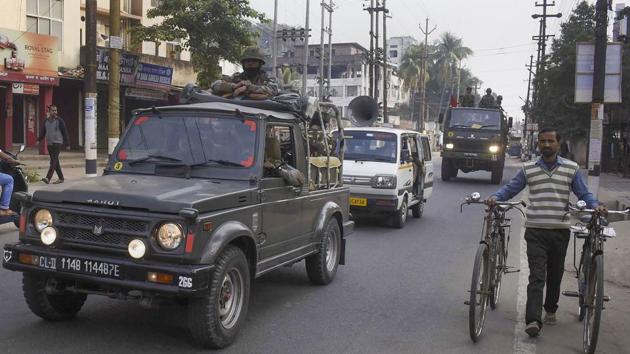 Army personnel patrol a street in Guwahati on Thursday.(PTI Photo)