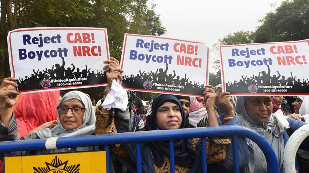 Muslim women take part in a protest rally against CAB and NRC, in Kolkata. (PTI) Muslim women take part in a protest rally against CAB and NRC, in Kolkata. (PTI)