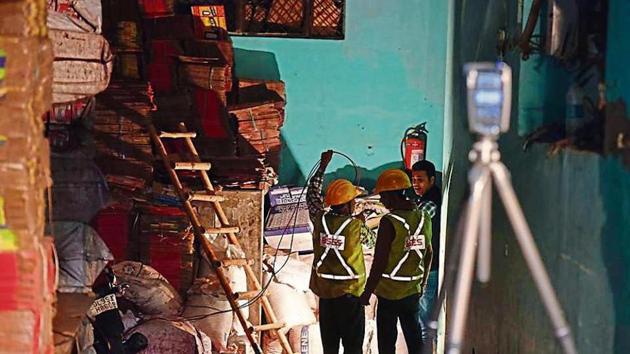 Initial probe into the Anaj Mandi fire that claimed 43 lives last Sunday suggested that the blaze could have started from electric meters installed under a staircase on the second floor. (Sanchit Khanna / HT File) Initial probe into the Anaj Mandi fire that claimed 43 lives last Sunday suggested that the blaze could have started from electric meters installed under a staircase on the second floor. (Sanchit Khanna / HT File)