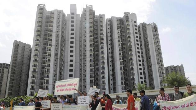 Homebuyers during an earlier protest in Sector 137, Noida, against Logix over the builder delaying possession of flats. (HT Archive) Homebuyers during an earlier protest in Sector 137, Noida, against Logix over the builder delaying possession of flats. (HT Archive)