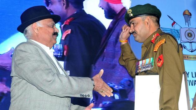 UT administrator VP Singh Badnore felicitates Subedar Major Yogendra Singh Yadav on the first day of the Military Literature Festival at Lake Club, Sector 1, in Chandigarh on Friday.(Ravi Kumar/HT) UT administrator VP Singh Badnore felicitates Subedar Major Yogendra Singh Yadav on the first day of the Military Literature Festival at Lake Club, Sector 1, in Chandigarh on Friday.(Ravi Kumar/HT)