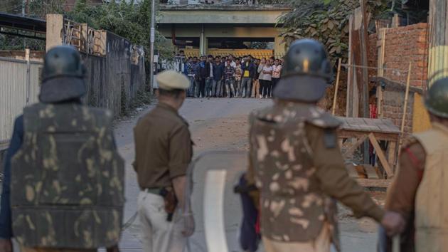 Protestors and police face off during a curfew in Guwahati. Guwahati has been at the centre of violent protests against the CAA that left two people dead and caused widespread damage to public property. (AP) Protestors and police face off during a curfew in Guwahati. Guwahati has been at the centre of violent protests against the CAA that left two people dead and caused widespread damage to public property. (AP)