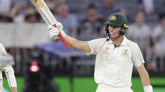 Australia's Marnus Labuschagne celebrates scoring 50 runs.(AP)