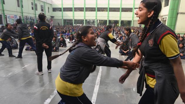 Students take part in a self defence training camp organized by the Special Police Unit for Women and Children (SPUWAC) at Kendriya Vidyalaya, Gol Market, in New Delhi. (Sonu Mehta / HT Photo)