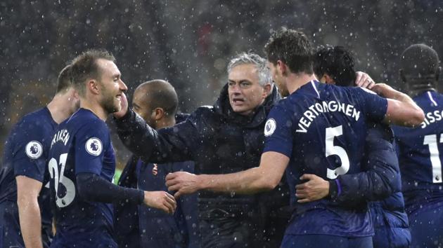 Tottenham's manager Jose Mourinho, centre, celebrates with his players. (AP) Tottenham's manager Jose Mourinho, centre, celebrates with his players. (AP)
