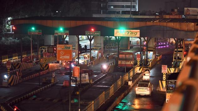 Over the past two months, hoardings and posters explaining the ease and utility of FASTag came up on either side of the highway.(Raj K Raj/HT Representative PHOTO)