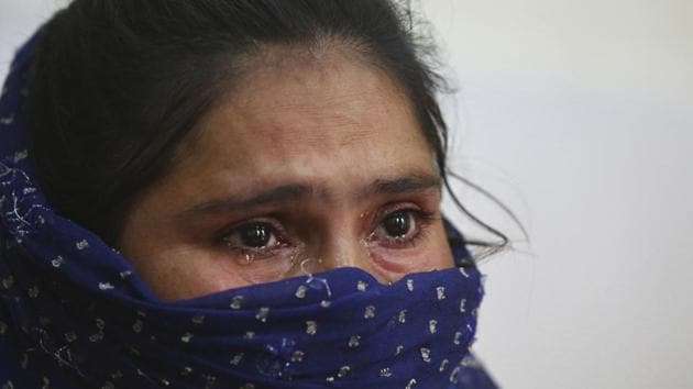 Jyoti Rani, a recovering tramadol drug addict, breaks down while narrating her story. “I wanted to kill myself, but I ended up becoming an addict,” she cried. A doctor prescribed tramadol to help kick the habit — instead, she formed a new one. She locked herself in her room, not eating or taking care of her two children. Rani used tramadol until she ran out of money and entered treatment. Now her family tells her she’s her old self again. (Channi Anand / AP)