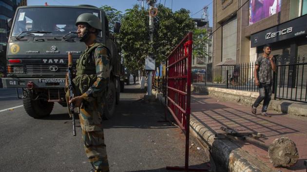 A soldier stands guard during curfew in Guwahati, India, Friday, Dec. 13, 2019. The US government has temporarily suspended official travels to Assam, the epicentre of the protests.(AP)