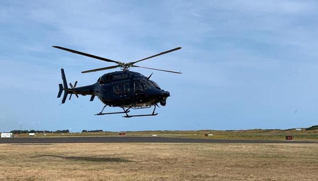 A New Zealand Police helicopter returns to Whakatane Airport after conducting a search for bodies in the aftermath of the eruption of White Island volcano, December 15, 2019. (New Zealand Police / Handout via REUTERS) A New Zealand Police helicopter returns to Whakatane Airport after conducting a search for bodies in the aftermath of the eruption of White Island volcano, December 15, 2019. (New Zealand Police / Handout via REUTERS)