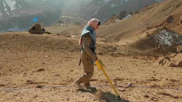 An Afghan deminer at work. Mahaiuddin’s son, Moujtaba, was killed along with two friends, aged 12 and 14, on May 17 when they went looking for berries. When none of them had returned the next day, Mahaiuddin and other residents from his tiny village, called Ahangaran, started searching. “I found my son with just his chest and head left,” Mahaiuddin recalled. (AFP) An Afghan deminer at work. Mahaiuddin’s son, Moujtaba, was killed along with two friends, aged 12 and 14, on May 17 when they went looking for berries. When none of them had returned the next day, Mahaiuddin and other residents from his tiny village, called Ahangaran, started searching. “I found my son with just his chest and head left,” Mahaiuddin recalled. (AFP)