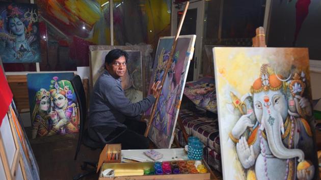 Ranjeet Singh is applying finishing touches to a Lord Krishna painting in his studio in west Delhi’s Moti Nagar. With him are a galaxy of gods —Shiva, Ganesha, Vishnu, the Buddha, all painted by him and his brother. Set up in 1951 by his father and uncle, the studio “Rangroop”, is known for its calendar art. “Many people think that calendar art is dead, but the fact is my hands are full,” says Singh, and he isn’t exaggerating. (Raj K Raj / HT Photo)