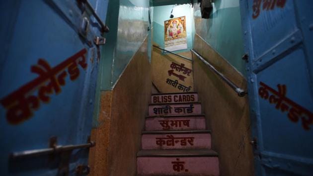 Many artists say that computers and software such as Photoshop have adversely affected their art even as the demand for calendars remains high. Prakash Chandra Gilotra, who runs Subhash Calendar Co in Delhi’s Nai Sarak, which has been in the business since 1971, says he has over 2,000 original calendar paintings in his collection and does not commission many new calendar paintings. (Raj K Raj / HT Photo)